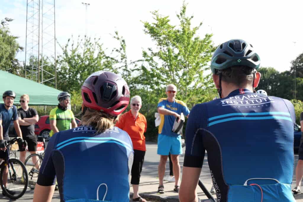 Caroline and Mads talking to other riders and crews before Helnæs24 2022